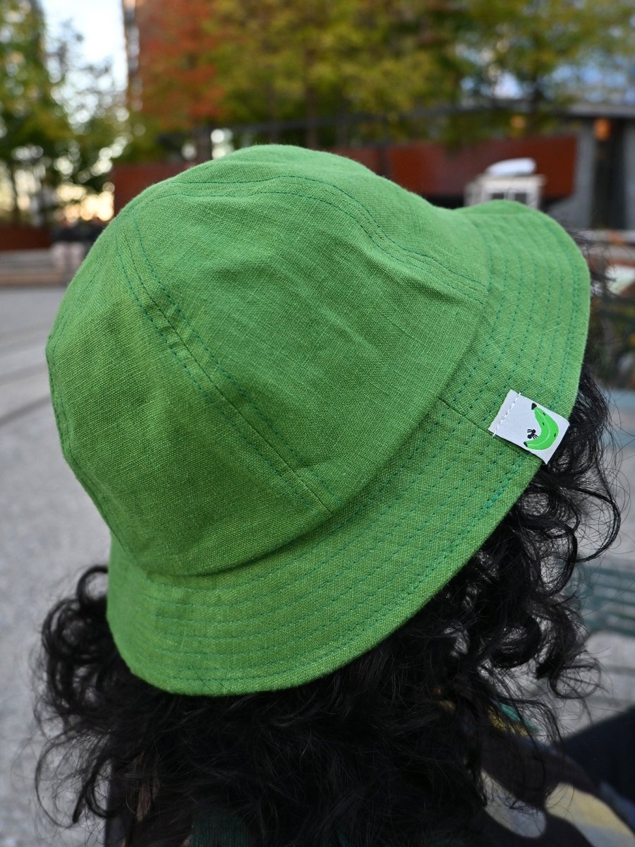 "Plantain & Ant" Linen bucket hat. Designed by HO HOS HOLE IN THE WALL brand. Made in NYC.